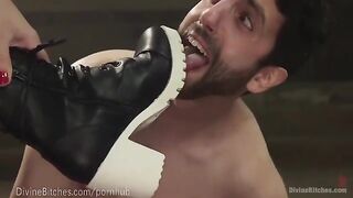 The powerful and muscled dominatrix beats and dominates her slaveboy