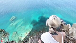 A cute girl passionately sucks her ex-boyfriend's big dick on the ocean shore
