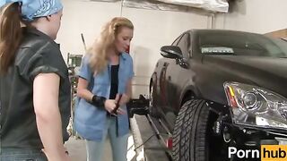 A tiny ginger girl is being punished in the garage, in a steamy scene from Lesbian Body Shop - Scene 4