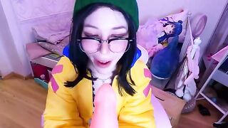 A pretty cosplay girl lost in a game and caressed herself with a dildo