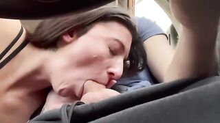 A couple enjoys a public road trip with some intense oral action