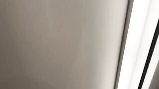 A hot chick is having fun with a guy in a fitting room
