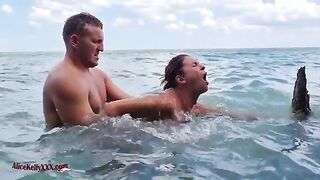 A couple makes amazing love in the blue lagoon, it's really hot!