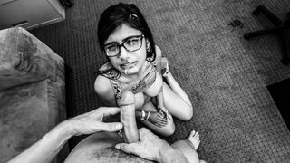 A young woman attends a porn audition in a black and white film style