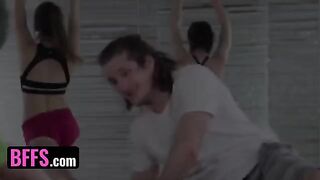 A yoga enthusiast is having fun with his coach and classmates during a session