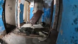 A sexy girl is walking around a terrible house with her boyfriend