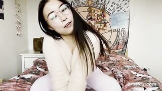 A very happy Chinese girl playing with herself for her fans in a steamy homemade video