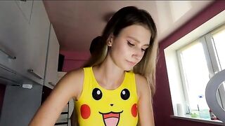 The girl is too close with someone in the kitchen