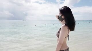 A petite islander girl is shooting her sex vlog on the balcony