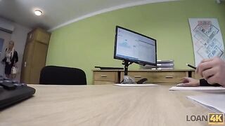 A business lady gets a loan from the bank for some money