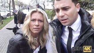 The collector has sex with a blonde in front of her husband