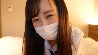 A Japanese girl wearing a sailor suit masturbates the guy’s cock with her hand