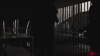 A passionate lesbian encounter behind bars, full of desire