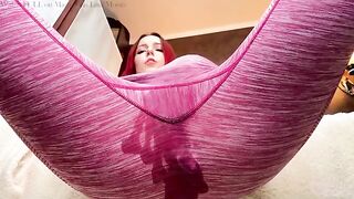 The girl is stretching her ass with a butt plug and fingers