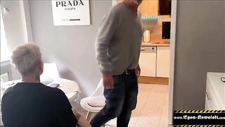 The husband does not notice anything as his wife gets fucked right in front of him