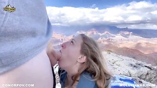 A big booty blonde amateur couple fucks on top of a cliff in POV style