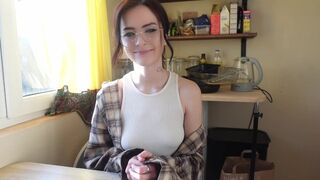A nerdy girl shows her real face when she gets her strapon on