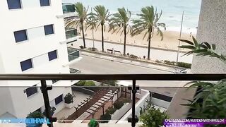 The couple engaged in public sex right on the balcony, with a stunning view of the sea