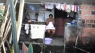 A girl did not know that there was a camera in the room and she got caught
