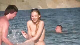 Nude mature woman is having fun on the beach in HD