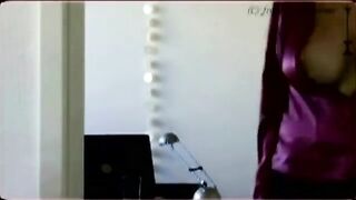 A peeping guy saw girl undressing and got a hard on