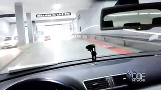 A sweet girl gives a blowjob to a guy while driving