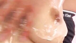 Oiled Japanese boobs squeezed and fingered with passion