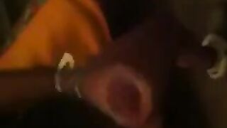 The guy masturbates in front of the mirror with pleasure