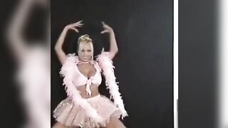 A sexy Russian girl is dancing and stripping eroticly