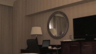 He undressed the whore in the hotel room for sex