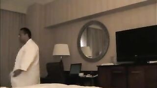 He undressed the whore in the hotel room for sex
