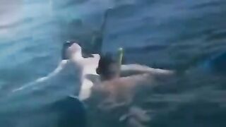 Aquatic sex of aqualangists at the bottom of the sea