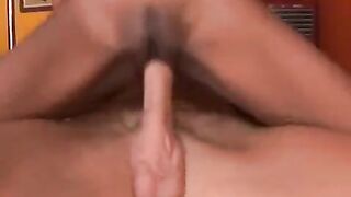 Skinny black teen rides and cums on a big white cock
