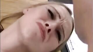 A girl is being fucked by a hand and a dick at the same time