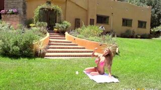 Babe is having fun with a guy on the lawn