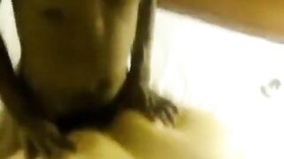 A fat woman lays down between two guys with big cocks
