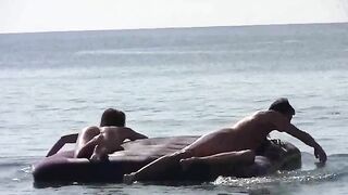 A naked beauty has fun on the sandy beach