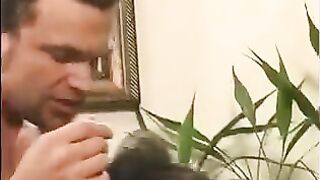 A 40-year-old man playfully pinches the nipples of a young girl