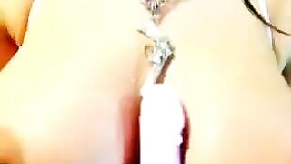 Busty brunette masturbates at home on webcam in a steamy show