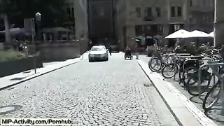 The girl walked naked in the city and showed her tits in public