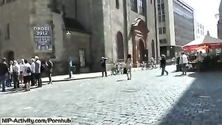 The girl walked naked in the city and showed her tits in public