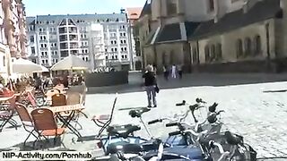 The girl walked naked in the city and showed her tits in public