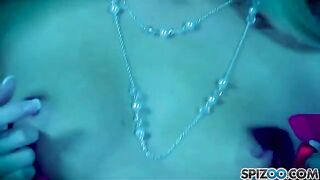 A blonde woman masturbating with a big dildo, bringing herself to orgasm