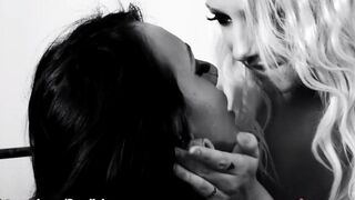 Two lesbians fuck each other with a dildo on the bed