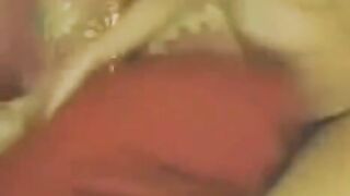 A Chinese girl masturbates in front of her webcam, showcasing her solo performance