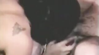 A guy fucks a strapon while another plays with his dick