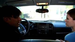 The girl makes a blowjob to the guy, who drives a car