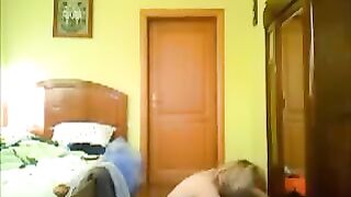 A guy watched porn with a girl through a hole in the wall