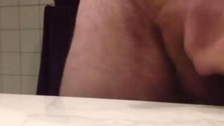 A girl made a quick handjob right on the table at work