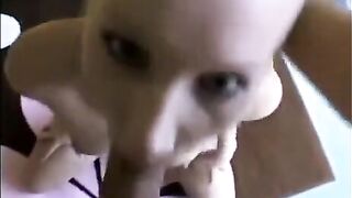 The chick in the frame is an avid sucker of huge cock heads